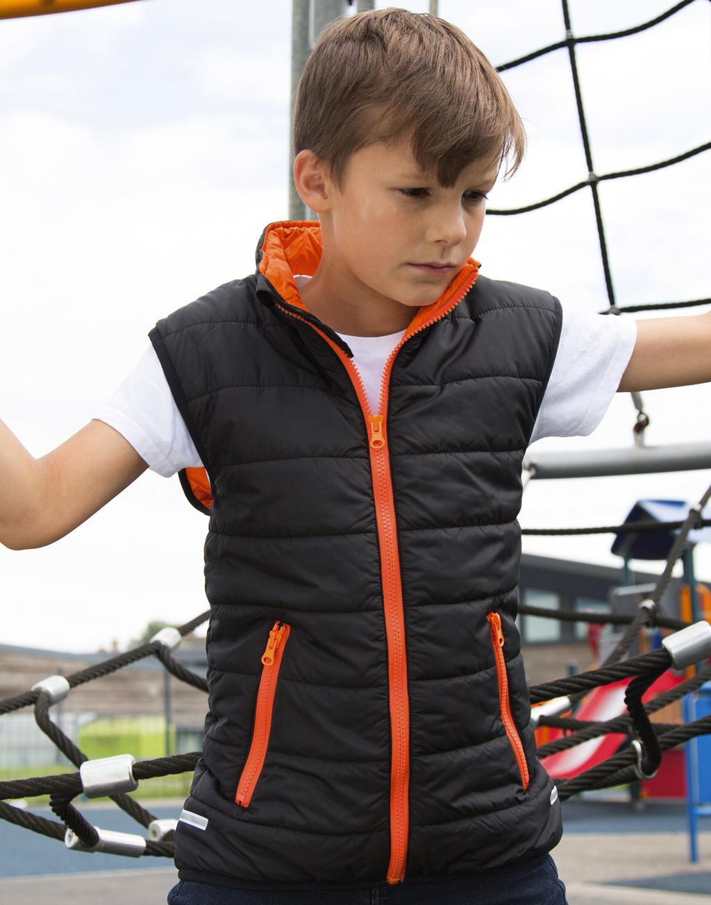  Junior/Youth Padded Bodywarmer in Farbe Black/Orange